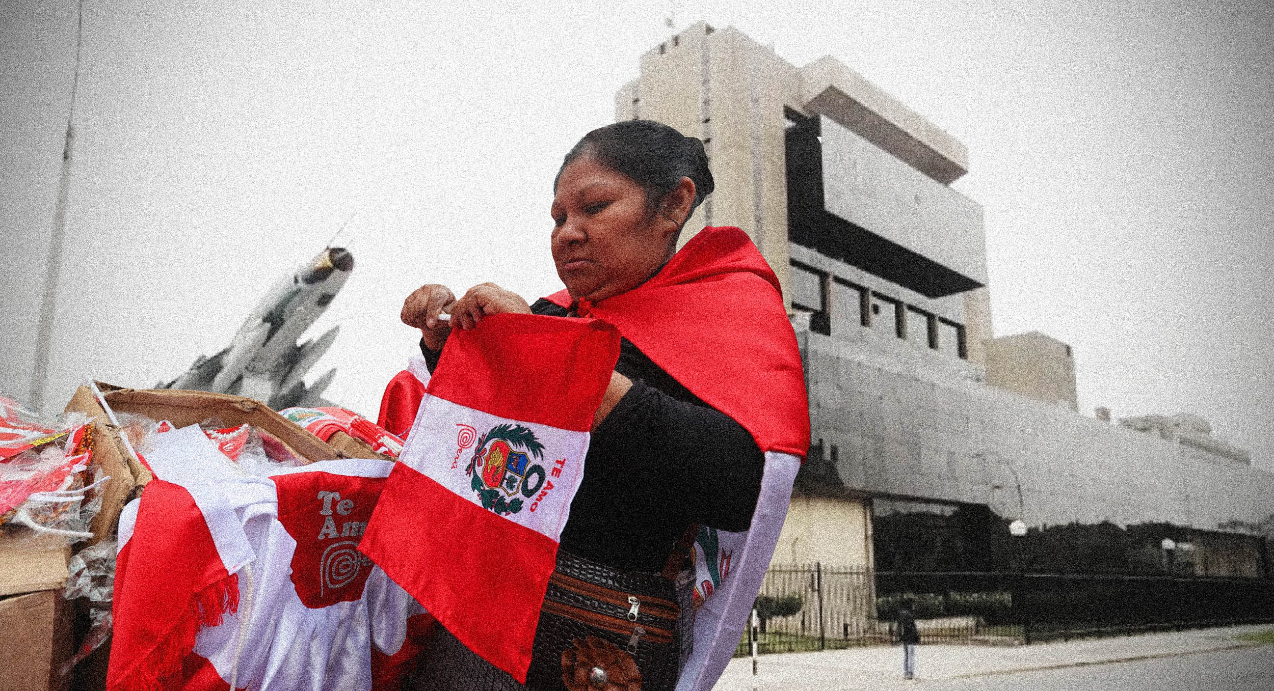Fachada del Ministerio de Defensa y una comerciante de textiles con símbolos patrios